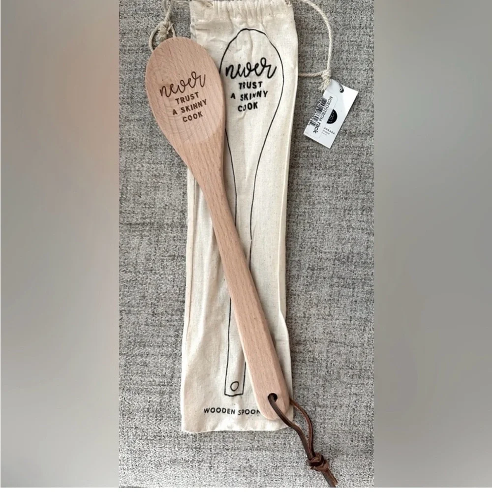 Wooden Spoon with engraved “Never trust a skinny cook” housewarming gift